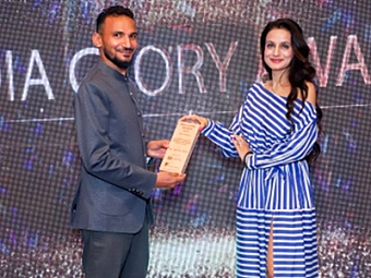Web Key India receiving the award: Best Web Development Company in Delhi NCR 2022