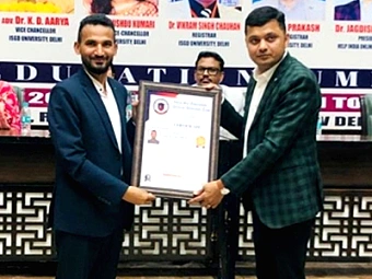 Web Key India receiving the award: Best Web Development Company in India 2024